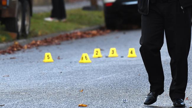 Police markers on the road outside a house that was shot at in Frankston. Picture: Nicole Garmston