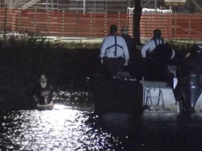 Jared Raccanello jumped into the waters of Albert Park Lake after allegedly stabbing a St Kilda man on a bus. Picture: 9 News