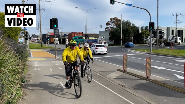 Cyclists ride along Whitehall St in Yarraville