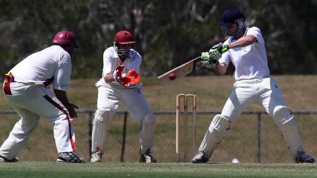 2014: Ryan Beere of Surfers Paradise Demons plays the delivery of Ryan Kettle of Palm Beach Currumbin during the Kookaburra Cup match played at Sir Bruce Small park, Gold Coast. Picture: Regi Varghese