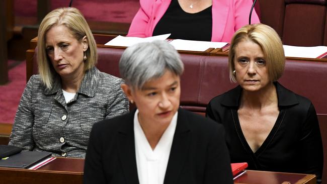 Labor Senate leaders Katy Gallagher and Kristina Keneally listen to Penny Wong’s condolence motion for late Senator Kimberley Kitching on Monday. Picture: AAP