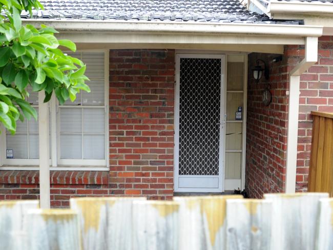 Shots were fired into the front door. Picture: Andrew Henshaw