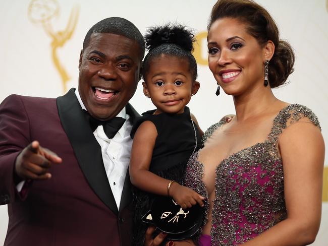 Tracy Morgan and wife Megan Wollover with their daughter Maven Sonae Morgan in the press room at the 67th Annual Primetime Emmy Awards.