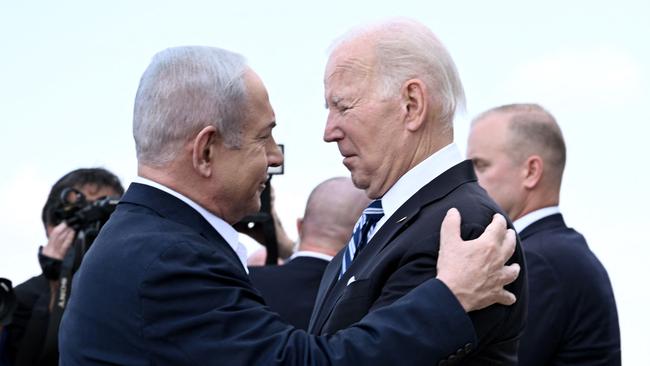 Israel Prime Minister Benjamin Netanyahu greets US President Joe Biden upon his arrival at Tel Aviv on October 18, last year. Picture: AFP