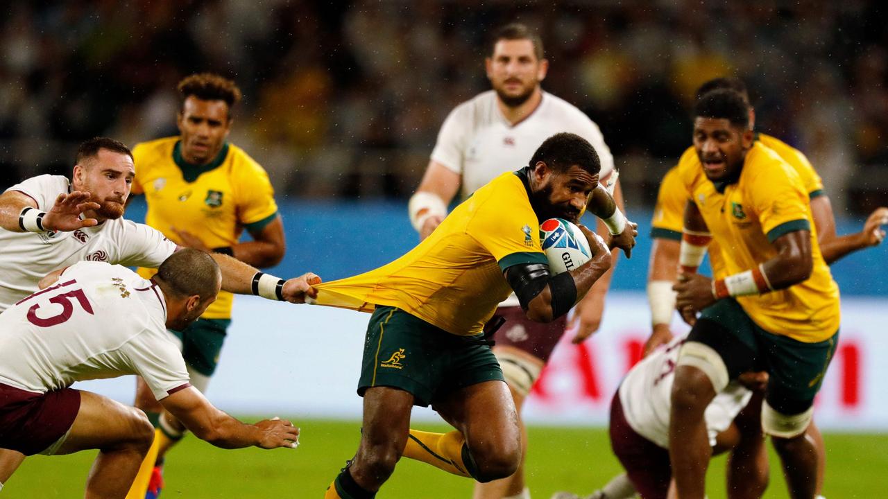 Australia winger Marika Koroibete runs to score a try at Shizuoka Stadium Ecopa.