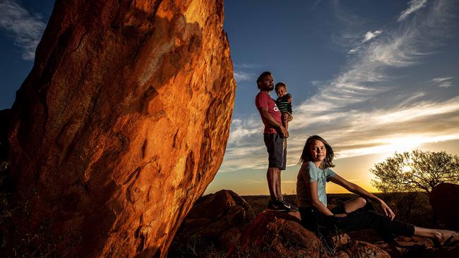 Justin Corbett and Delenn Dowden with their son Chieften at the Peace Gorge near Meekatharra in Western Australia. Picture: Colin Murty