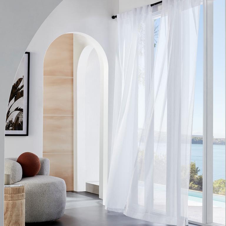 Lightweight, sheer curtains are now favoured by home decor stylists and renovators. Image: Domayne