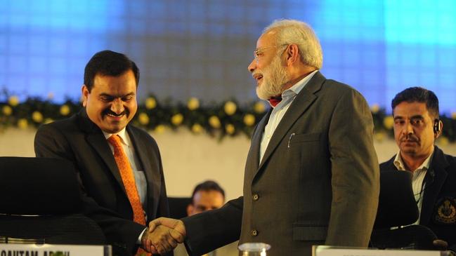 Adani in 2011 with the then Gujurat chief minister and current Indian Prime Minister, Narendra Modi. Picture: Getty Images