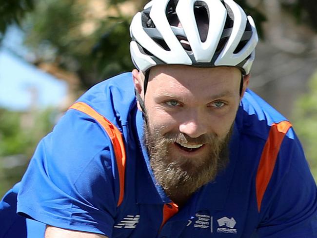 Presser to launch TDU Village of Cycling in Vic Square. Melbourne Demons star, Max Gawn is the ambassador for the Tour Down Under. Paddy Crowe, 7, got to see what it was like riding against the star footballer. 8 November 2022. Picture Dean Martin