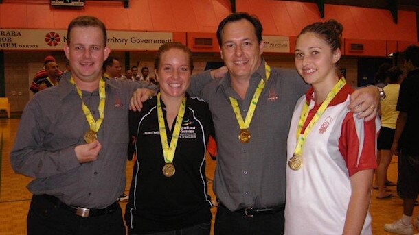 Michelle after winning Arafura Games Basketball Gold, with Jason Ivinson, Staci Trindle-Price and coach Rod Tremlett. Picture: SUPPLIED