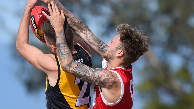 Woori Yallock's Shane Kennedy marks in front of  Healesville's Jaden McGrath  Picture: Josie Hayden