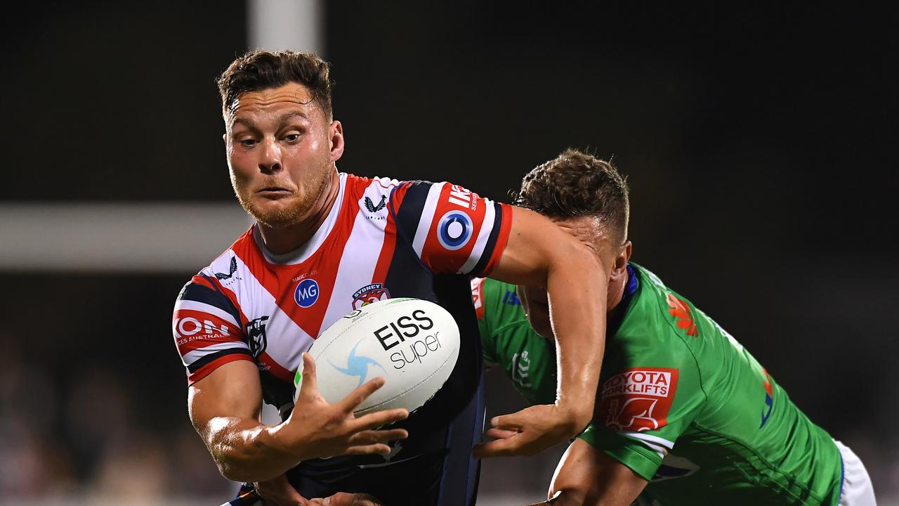 MACKAY, AUSTRALIA - SEPTEMBER 02: Lachlan Lam of the Roosters is tackled during the round 25 NRL match between the Canberra Raiders and the Sydney Roosters at BB Print Stadium, on September 02, 2021, in Mackay, Australia. (Photo by Albert Perez/Getty Images)