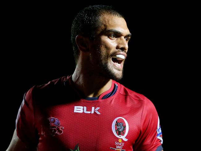 Karmichael Hunt playing in a trial for the Reds.