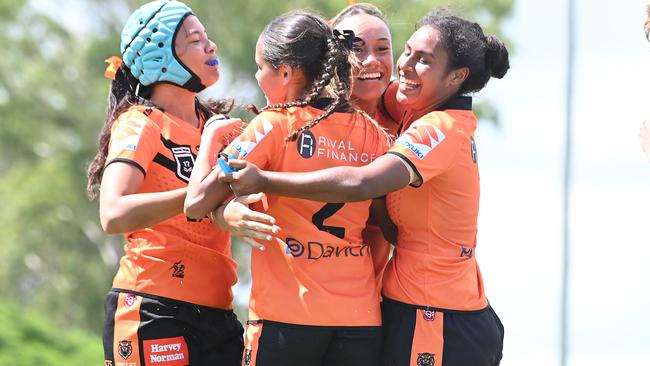 The Tigers girls celebrate earlier in the season - they were smiling again in round 5. Picture, John Gass