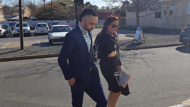 Clarence Yates, left, outside the Christies Beach Magistrates Court with lawyer, Stacey Carter. Picture: Sean Fewster