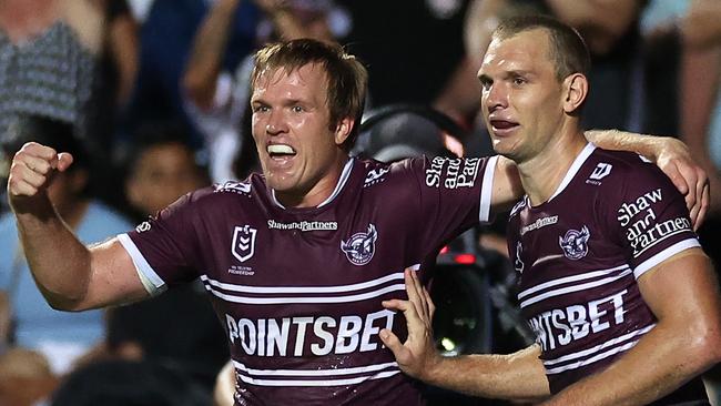 SYDNEY, AUSTRALIA - MARCH 16:  Tom Trbojevic (R) of the Sea Eagles celebrates with Jake Trbojevic of the Sea Eagles after scoring a try during the round three NRL match between Manly Sea Eagles and Parramatta Eels at 4 Pines Park on March 16, 2023 in Sydney, Australia. (Photo by Cameron Spencer/Getty Images)