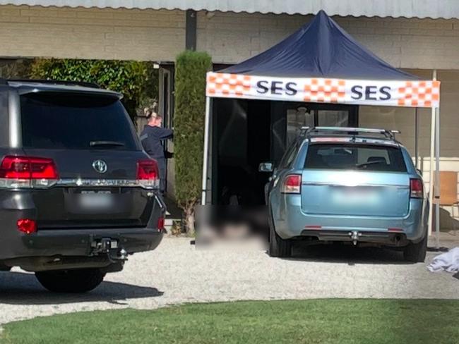 Forensics photographing the alleged murder scene after Marc Pettersen was killed at the Calder Family Motel in Kangaroo Flat, Bendigo. Picture: Gianni Francis.