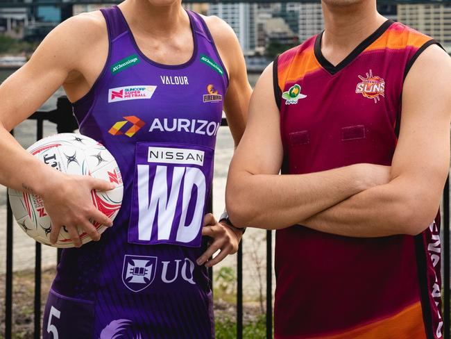 Kim Ravaillion and Glenn Ormesher pose for photo. Credit: Netball Queensland