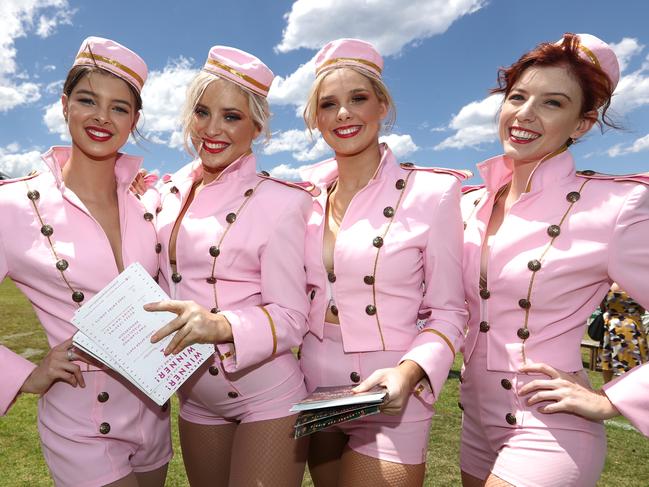 Pink Flamingo girls Emilia Foster, Jorjah Burgess, Mia Rose Stallon and Caitlin Hultgren during Melbourne Cup Day at The Gold Coast Turf Club. Photograph: Jason O’Brien.