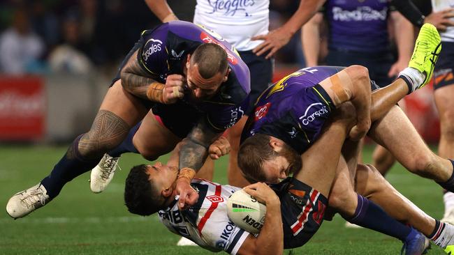 Asofa-Solomona about to drop on Suaalii. NRL Imagery