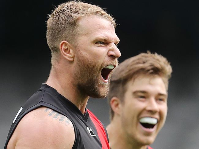 AFL Round 1. Essendon v Fremantle at Marvel Stadium..  21/03/2020.   Jake Stringer of the Bombers celebrates his goal in the second quarter and lets Nat Fyfe of the Dockers know all about it  . Pic: Michael Klein