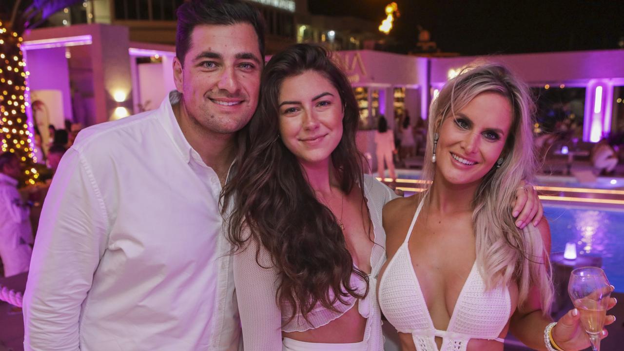 Julian Kannis, Natasha Janevska, Georgie Rule at La Luna Beach Club on New Year's Eve, (for the Pulse). Picture: Marcelo Lang