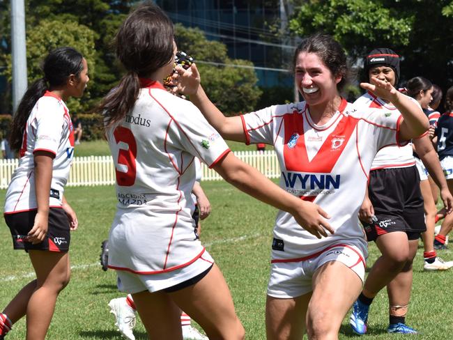 Taylah El-Ters (right) celebrates with Emma Warr. Picture: Sean Teuma. Lisa Fiaola Cup trial, St George Dragons vs Sydney Roosters at Mascot Oval, 13 January 2024.