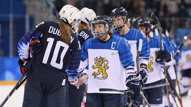 Meghan Duggan #10 of the US shakes hands with Riikka Valila #13 of Finland following their 5-0 victory. Picture: Getty Images