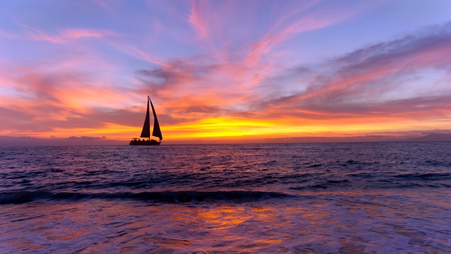 Wide open waters and tangerine skies.