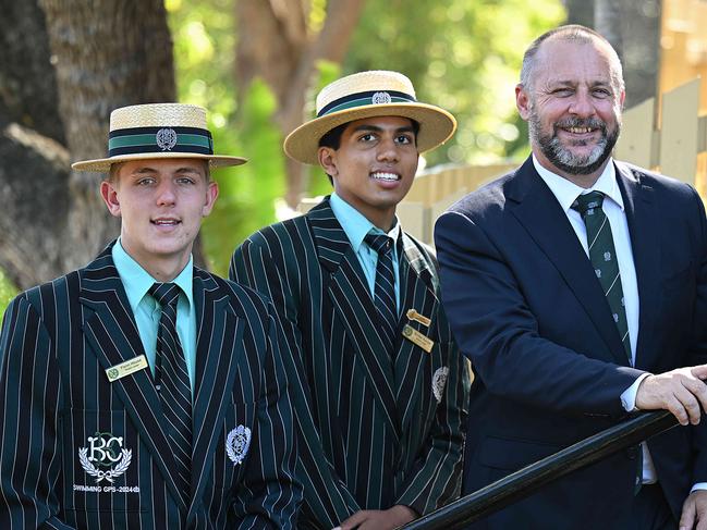 29/8/2024: Brisbane Boys College Headmaster Andre Casson with year 9 students (L-R) Andre Venter, Shanuka Silva, and Jacob Bardell, at the College in Toowong, Brisbane. pic: Lyndon Mechielsen/Courier Mail