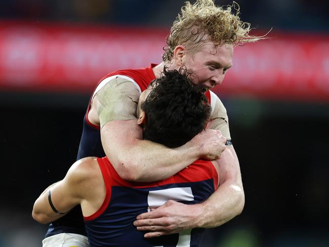 AFL Round 5.   18/04/2021. Hawthorn vs Melbourne at the MCG, Melbourne.   Christian Petracca of the Demons  celebrates his goal in the fourth quarter with Clayton Oliver   . Pic: Michael Klein