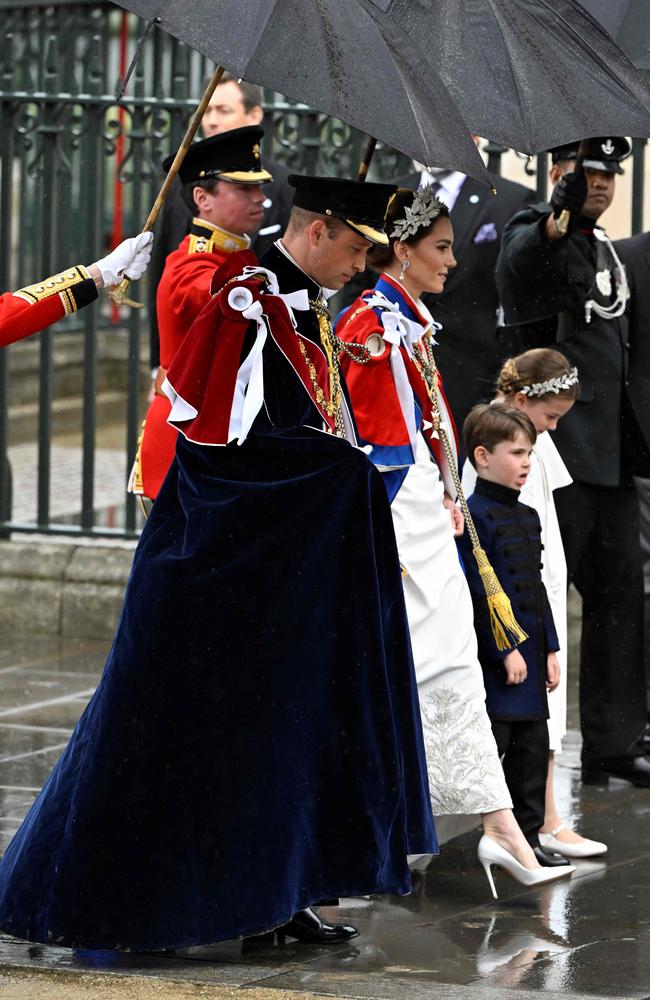 Prince William and Kate arrived together with Princess Charlotte and Prince Louis, while Prince Harry arrived earlier alone. Picture: Toby Melville / Pool / AFP