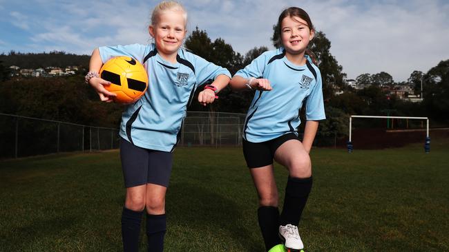 Ruby Playle 7 with teammate Maddy Ball from Waimea Heights School Soccer Club Picture: NIKKI DAVIS-JONES