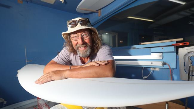 Collingwood star Mason Cox commissioned Torquay surfboard shaper Darren 'Dicko' Dickson to create a work of art on a board. Dicko in his Surfing Museum studio. Picture: Alan Barber