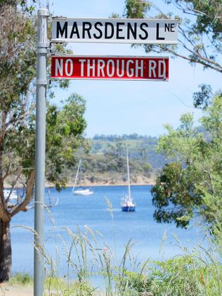 A street sign at Eggs and Bacon Bay.