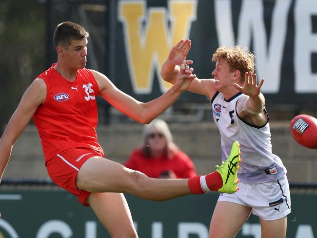 Ayden McCarroll snaps through a goal. Picture: Rob Lawson/AFL Photos