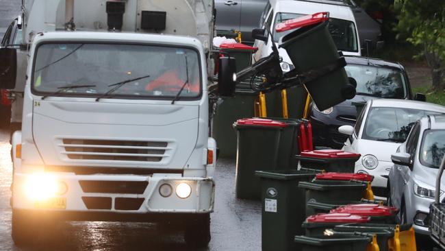 Is fortnightly general waste pick-up a sound environmental move, or will it just cause a big suburban stink? Picture: John Grainger