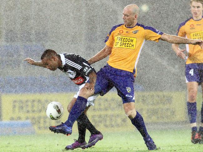 Rees playing for Gold Coast United against Melbourne Victory in 2012.