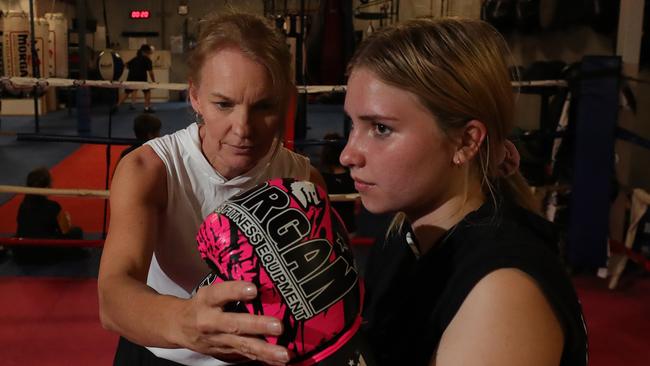 Fight 4 Youth founder Leisa J Logan gives instruction to Jaymee Lee Cartwright in the ring. Picture Glenn Hampson