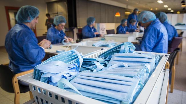 Women make face masks in The Netherlands