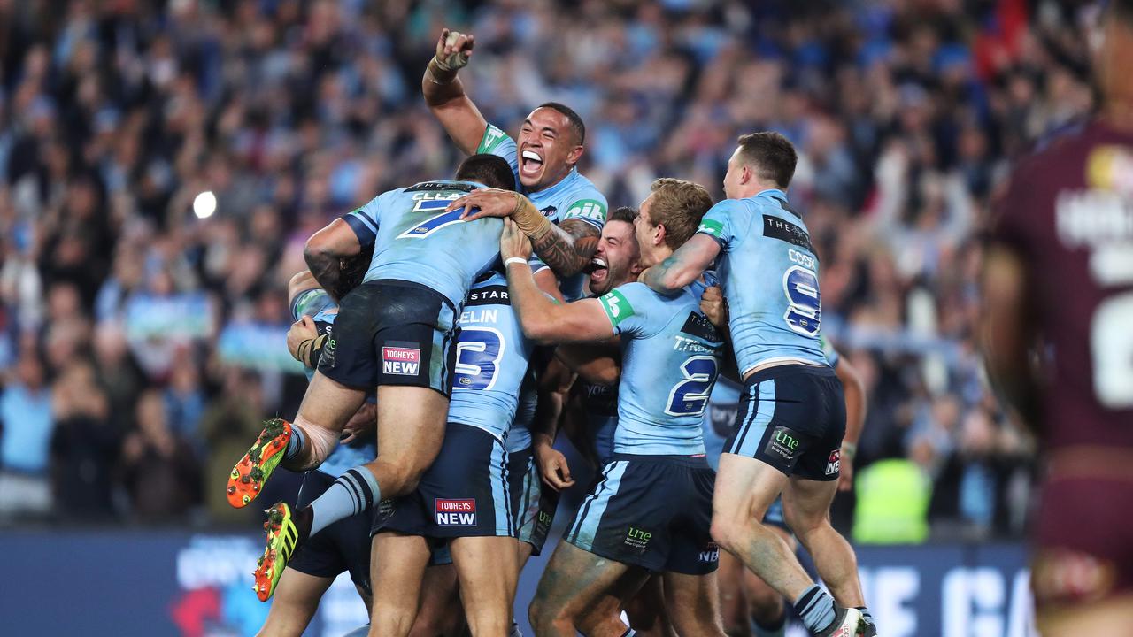 The Blues celebrate victory in State of Origin Game II.