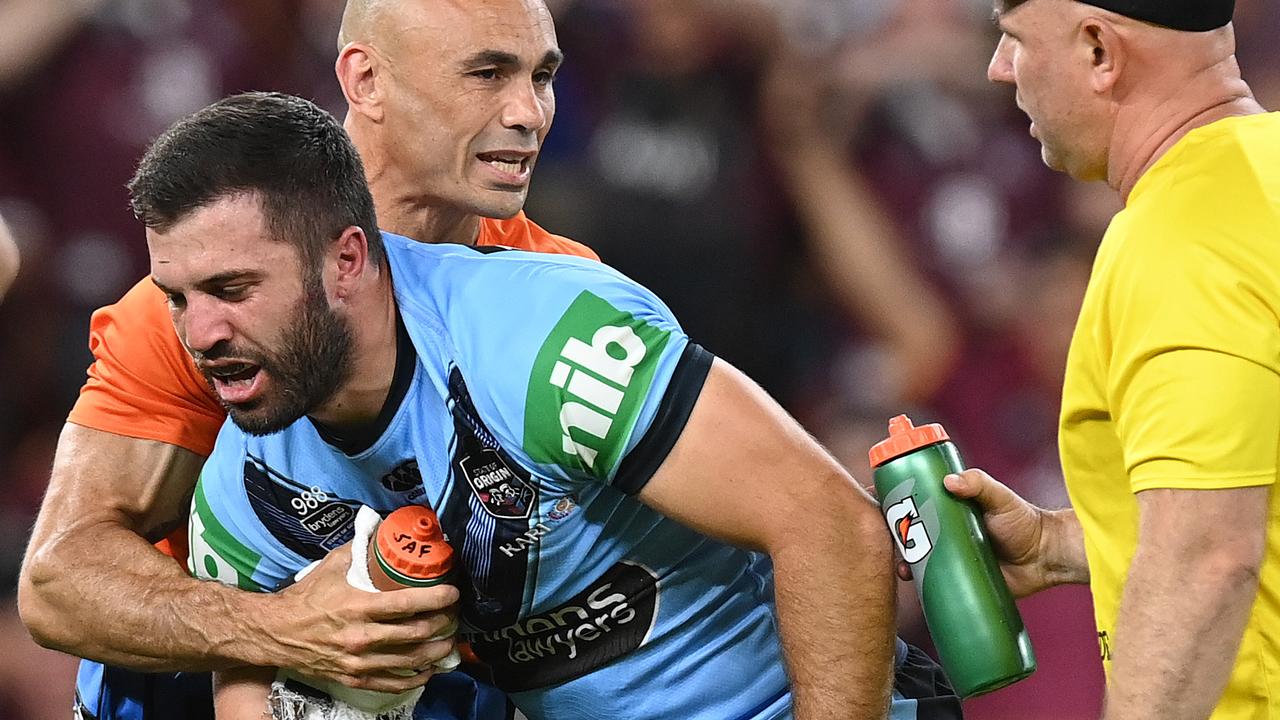 James Tedesco stumbles after suffering a head knock. (Photo by Bradley Kanaris/Getty Images)