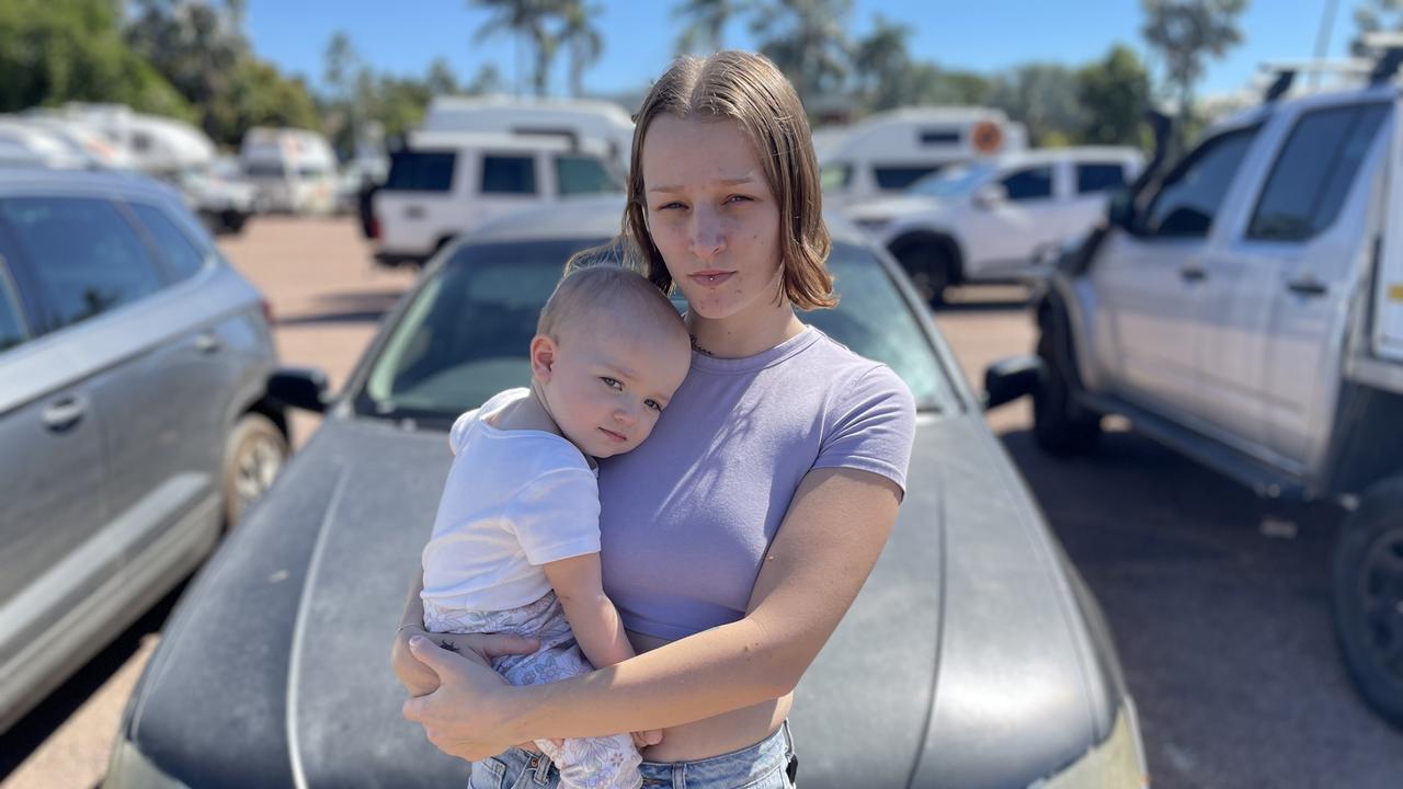 21 year old mother India Sparks with her 15 month old daughter Violet and LPG run car which is stuck at Townsville's Sealink terminal because there's nowhere to refuel it.