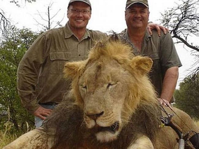 Trophy hunter ... Walter Palmer (left) with the body of a lion (not Cecil). Picture: Facebook