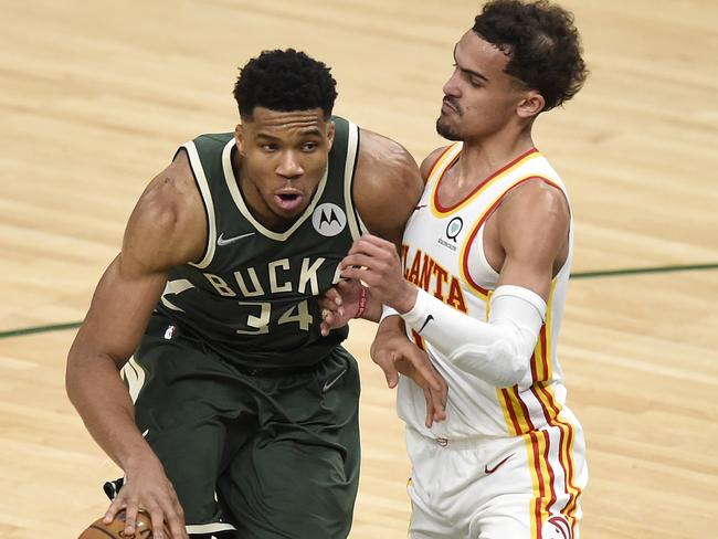 Trae Young took on Giannis Antetokounmpo and lived to tell his tale.