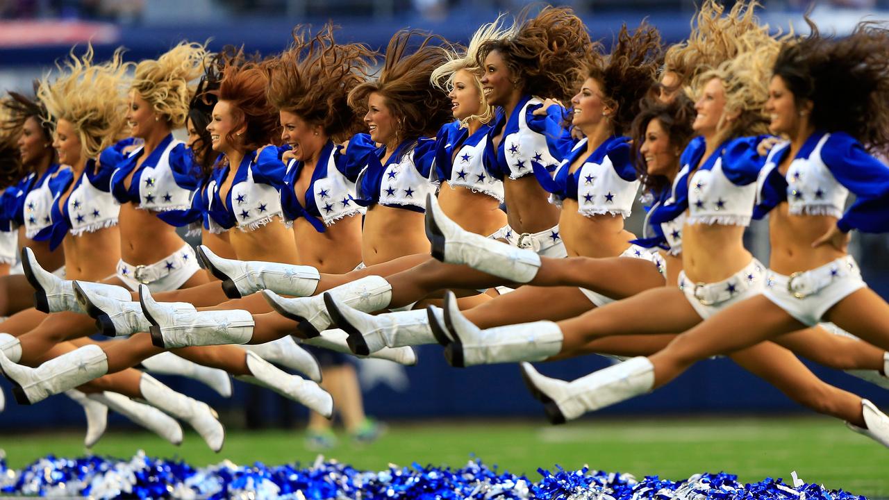 Dallas Cowboys cheerleaders perform. Photo by Jamie Squire/Getty Images.