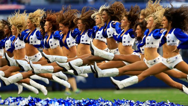 Dallas Cowboys cheerleaders perform. Photo by Jamie Squire/Getty Images.