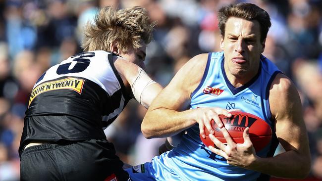 Sturt’s Fraser Evans grabs the ball during his Jack Oatey Medal-winning performance in the Double Blues’ SANFL grand final triumph over Port Adelaide. Picture: Sarah Reed