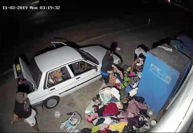 CAR FULL: Three people loading a car with items donated at the Toormina Lifeline store. Picture: Contributed