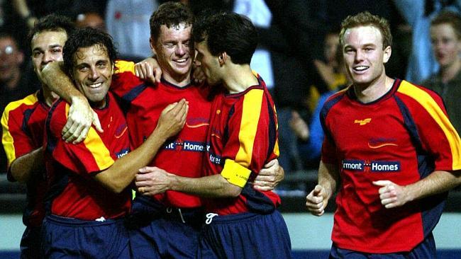  Carl Veart, third from left, is congratulated for scoring Adelaide United's first goal in its debut match on October 17, 2003, against Brisbane Strikers.  